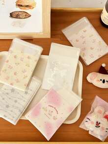 50个装自粘礼品袋，礼品包装用品，带自粘功能的礼品包装袋，小型卡纸OPP包装袋，简约透明自封包装袋，适用于礼品、珠宝包装、婚礼、派对、旅行、毕业典礼、生日、周年纪念、烘焙食品、圣诞节等场合。 - 多款 - 查看 3