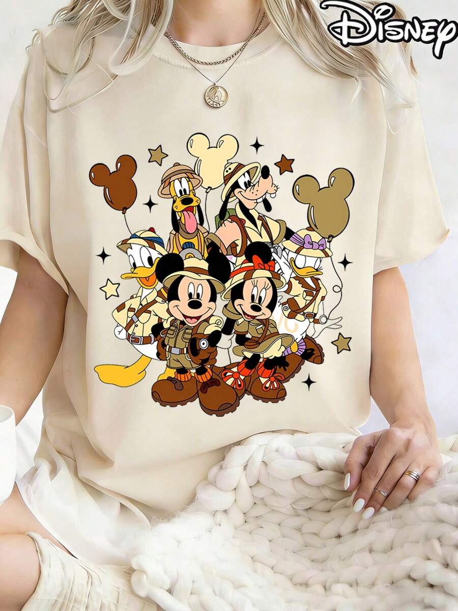 This Is An Officially Licensed Women's Summer Cotton T-Shirt. The Front Features Classic Disney Characters On An Adventure Theme, Including "Animal Kingdom" And "Jungle Adventure," With The Theme "Travel In 2026," Creating A Vibrant Party Atmosphere. It's Perfect For Taking Photos At Disneyland, As A Travel Souvenir, For Everyday Casual Wear, Or To Layer With Family Outfits. Suitable For Everyday Wear, It's Also An Ideal Valentine's Day Gift For Friends And Family. This Style Belongs To The Women's Spring Collection. The Fabric Is Thin, Soft, And Comfortable, Making It Perfect For Outdoor Wear. - Apricot - View 1