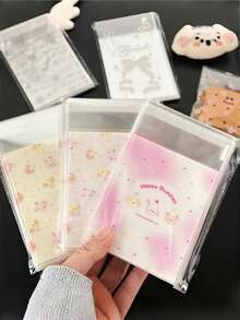 50个装自粘礼品袋，礼品包装用品，带自粘功能的礼品包装袋，小型卡纸OPP包装袋，简约透明自封包装袋，适用于礼品、珠宝包装、婚礼、派对、旅行、毕业典礼、生日、周年纪念、烘焙食品、圣诞节等场合。 - 多款 - 查看 2