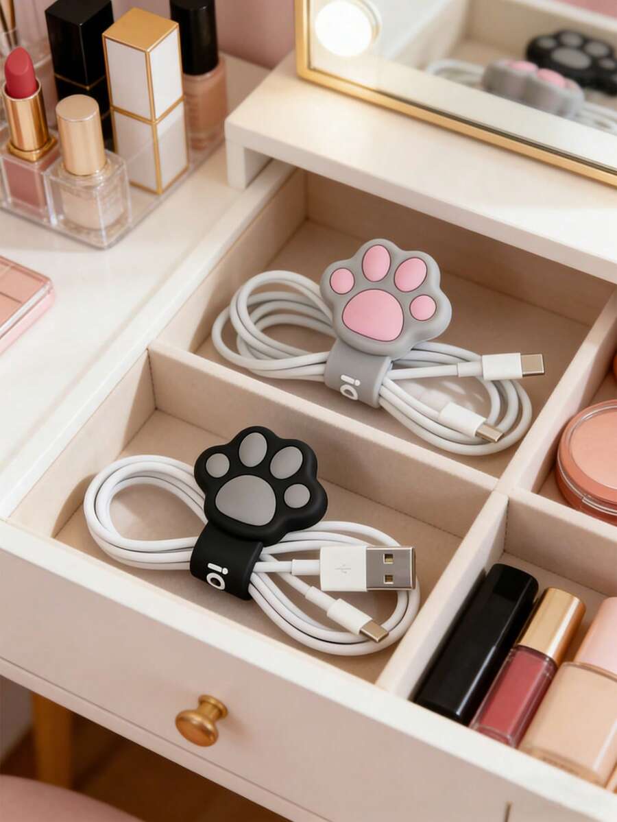 1个可爱猫爪造型硅胶线缆整理夹，可重复使用，适用于手机充电线、耳机线等，适合桌面、汽车、包包和旅行使用。