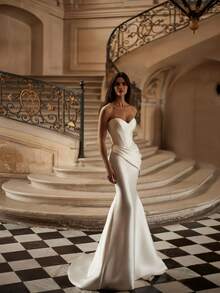 Sophisticated Strapless Mermaid Wedding Dress With Sweetheart Neckline And Open Back – Elegant Floor-Length Ivory Bridal Gown Featuring A Sculpted Silhouette That Flares Into A Dramatic Skirt, Accented By A Daring Low-Back Design. This Gown Combines A Timeless Bustier With A Captivating Mermaid Cut, Creating An Enchanting Look For Special Moments. Perfect For Weddings, Holiday Galas, Christmas Celebrations, Halloween Parties, Prom Nights, And Grand Occasions. A Stunning Formal Gown Ideal For Bridal Ceremonies, Receptions, Festive Events, Formal Dinners, Graduation Balls, And Cherished Celebrations. - 白色 - 查看 1