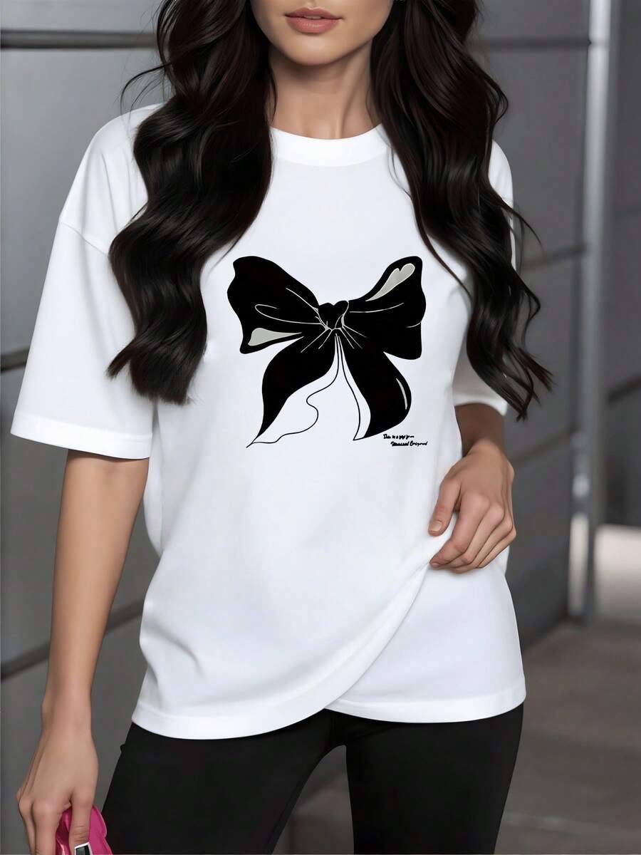 Moño grande que simboliza elegancia suavidad y confianza con trazos artísticos que evocan feminidad moderna en cada movimiento camiseta de mujer blanca casual cómoda 220g - Blanco - Ver 1