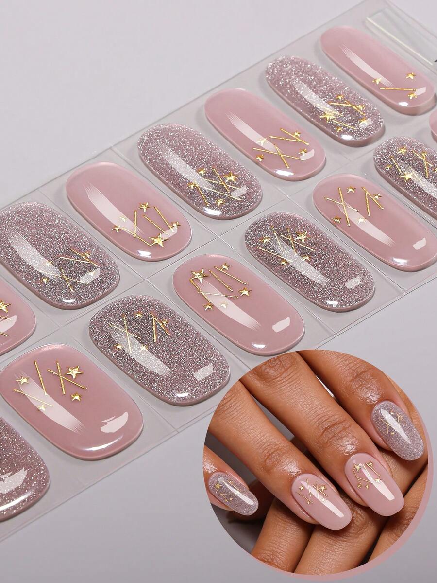 Bộ 16 miếng dán móng tay gel bán khô màu xám hồng ombre lấp lánh bạc, họa tiết ngôi sao vàng, phong cách sang trọng tinh tế, tự dính, dễ sử dụng, phù hợp cho phụ nữ và bé gái tự làm móng tại nhà.