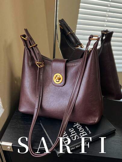 这款时尚复古的女士单肩包采用简约的纯色设计，搭配旋锁扣，尽显精致优雅，是通勤的理想之选。它可容纳中等大小的物品，并配有优质金属旋锁和拉链，方便取用。这款包采用高品质防水PU材质，是馈赠亲友的理想之选，也适合购物、约会、通勤、拍照、商务出行和休闲旅行等各种场合。