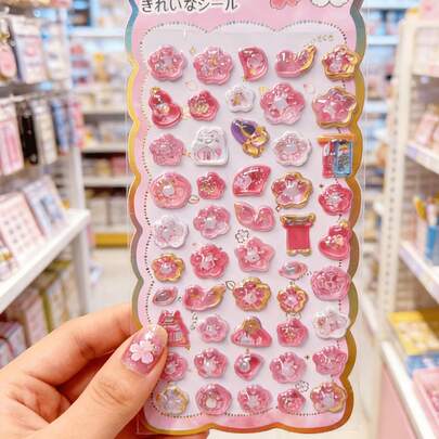 樱花、招财猫和日式扇子图案的3D贴纸，采用环氧树脂材质，表面覆以奢华的金箔。用途广泛，可用于DIY手工、手机壳、笔记本、礼品和装饰，适合所有年龄段。