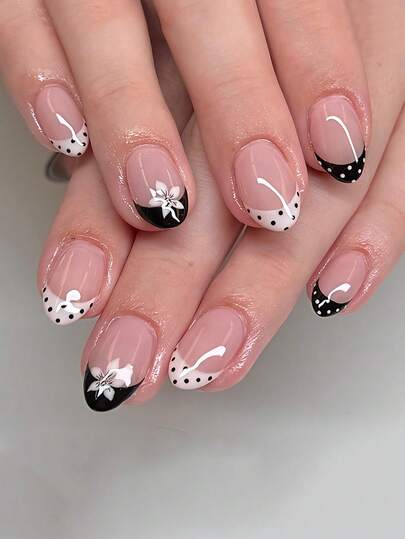 24pcs Short Oval Nail Stickers, This Nail Design Combines Classic French Manicure, Retro Polka Dots, And Elegant Floral Painting, Presenting A Sweet And Minimalist Aesthetic. The Simple Black And White Color Scheme, With Contrasting Polka Dots Accentuating The French Tips, Exudes A Vintage French Vibe. Not Only Visually Appealing, But Also Highly Versatile.