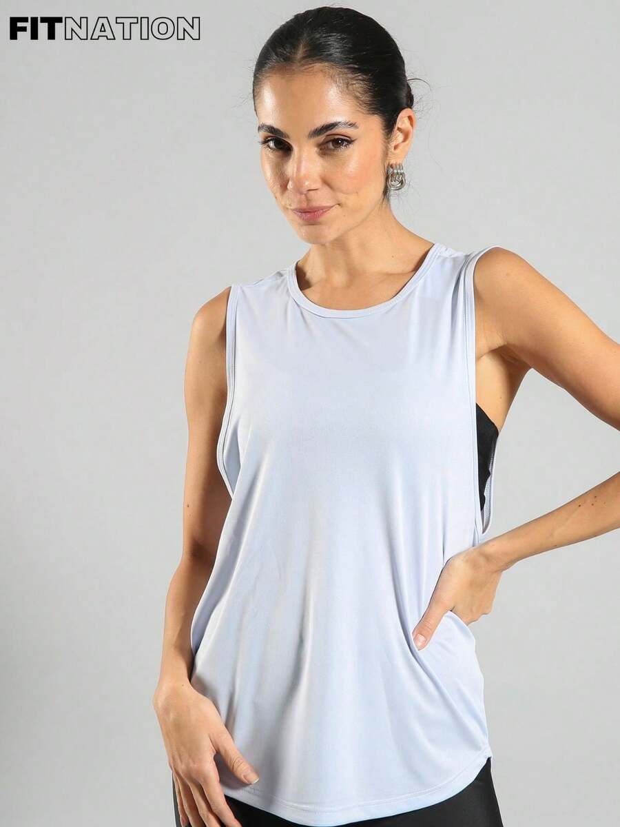 FITNATION Women's Fitness Tank Top With Elongated And Rounded Front And Back, Made From DRYFIT Technology Fabric, Ideal For The Gym. - 淺藍色 - 查看 1