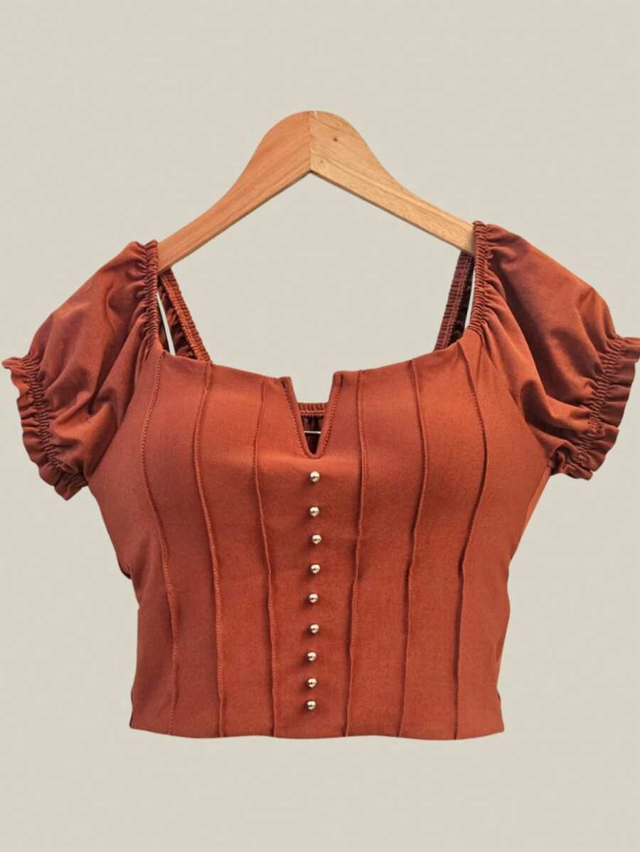 Blusa cropped com almofada no peito