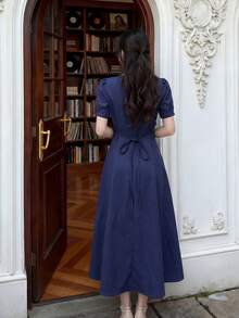 Đầm Y6Y - Mẫu đầm mùa hè mới màu xanh hải quân, kiểu dáng buộc dây, cài cúc đơn cho nữ. - Màu xanh hải quân - Xem 2