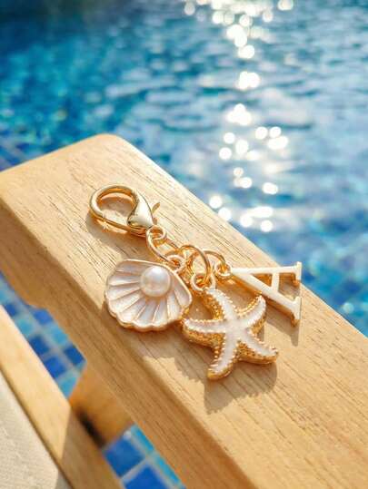 Bohemian Style Gold Letter Keychain With Shell And Starfish Decorations, A-Z Letters Optional, Beach And Holiday Themed Accessories, Essential For Spring And Summer Clothing, Personalized Pendant, Perfect For Decorating Backpacks, Wallets, Handbags Or As A Decorative Pendant, Ideal Gift For Friends, Classmates, Family, Beach Enthusiasts, Vacation Essentials, Bohemian Fashion Accessory, Personalized Keychain Suitable For Travel, Summer And Daily Use