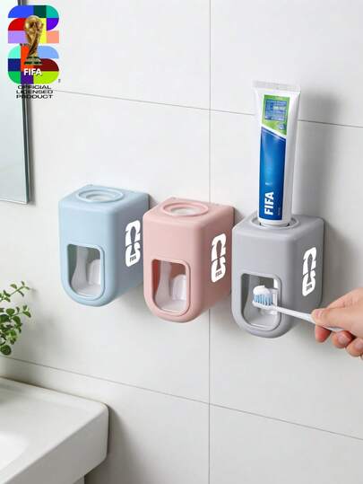 Máy phân phối kem đánh răng tự động lấy cảm hứng từ Cúp vô địch bóng đá Bắc Mỹ 2026, không cần dùng tay ấn nút, gắn tường, phụ kiện phòng tắm bằng nhựa bền chắc, chống bụi, dễ lắp đặt, nhiều màu sắc để lựa chọn, hoàn hảo cho phòng tắm gia đình, khách sạn, căn hộ, ký túc xá để chăm sóc răng miệng hàng ngày, quà tặng lý tưởng cho người hâm mộ bóng đá, người đam mê thể thao, người thích sắp xếp nhà cửa, đồ lưu niệm dành cho người hâm mộ và các vật dụng cần thiết để sắp xếp phòng tắm.