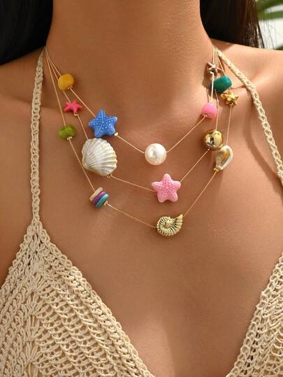 1件波西米亚风多层海洋风海星海螺项链（颜色随机）