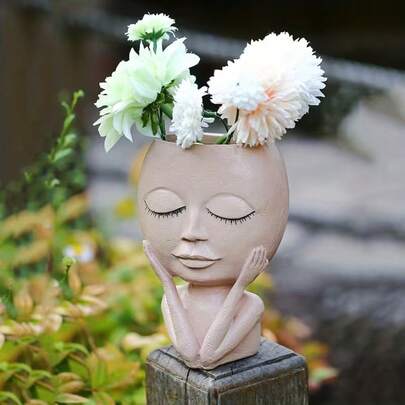 1. 娃娃造型花盆，北欧风格，复古高挑，绿色花盆，适合客厅摆放，设计独特，饰有男性肖像或冥想女性形象。