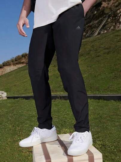  adidas 運動生活 純色鬆緊腰錐形休閒運動褲 男款