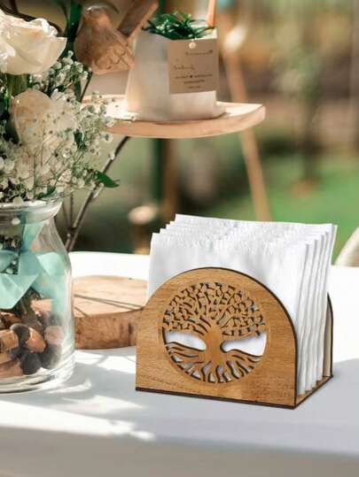 镂空生命树餐巾架，正面采用镂空工艺，图案为“生命之树”（枝繁叶茂，根系发达），装饰性强且透明，属于桌面/办公桌收纳用品，主要用于整理和展示餐巾，常见于家庭餐厅、咖啡馆或简餐店，适合北欧、原木风格。