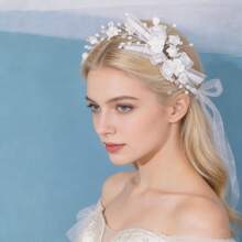 1 chiếc băng đô cài tóc nơ trắng đính ngọc trai, phụ kiện tóc cô dâu cho đám cưới. - trắng - Xem 2