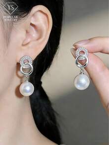 Hoa tai ngọc trai bạc hình số 8