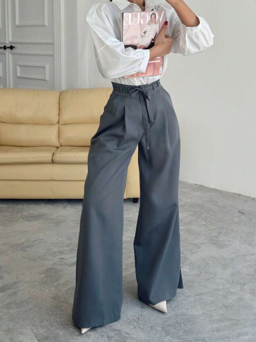 Quần tây nữ cạp cao phong cách vintage mùa hè 2026 SMILE CHIC, xẻ tà, dáng rộng, tôn dáng, chất liệu thoáng khí thoải mái, phù hợp cho đi làm, công sở và mặc hàng ngày.