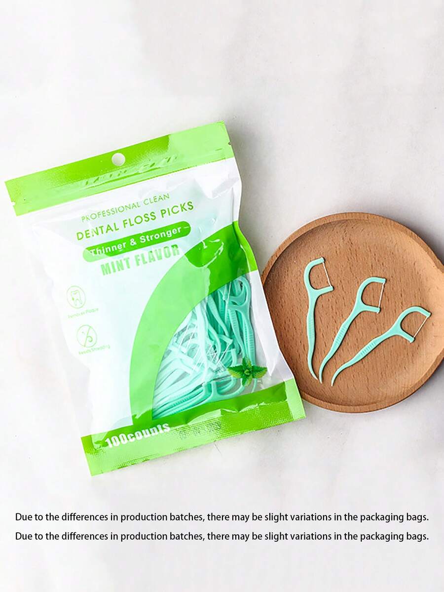 100 piezas de palillos de hilo dental con sabor a menta, palillos de hilo dental redondos de polímero de alta calidad, aptos para uso en el hogar y viajes - Verde Oliva - Ver 1