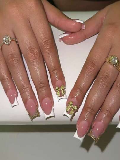 Bộ 24 móng giả vuông giúp nâng tầm phong cách, móng kiểu Pháp màu trắng đính đá vàng và nơ vàng, kèm 1 lọ sơn gel và 1 dũa móng, quà tặng lý tưởng cho phụ nữ và bé gái.