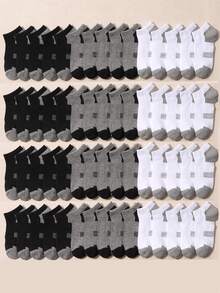 10 paires de chaussettes mi-mollet pour enfants, de couleurs unies noir, blanc, gris. Couleurs classiques minimalistes, confortables, respirantes et absorbantes. Convient pour le plein air, les sports et la maison - Multicolore - Voir 2