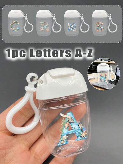 1个透明空洗手液瓶，印有贝壳和海星字母图案，字母A-Z。香水喷雾瓶，带挂钩和防摔硅胶盖，夏威夷旅行便携化妆瓶