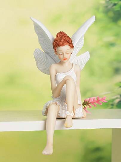 1 món đồ trang trí vườn cổ tích - Tượng ngồi bằng nhựa resin được chế tác tỉ mỉ với đôi cánh màu tím mộng mơ, thích hợp để trang trí trong nhà và ngoài trời, tạo thêm không gian quyến rũ.