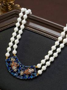 Mặt dây chuyền hình cá đính đá quý cổ điển, sự kết hợp sang trọng giữa vẻ đẹp cung điện xưa và các yếu tố tự nhiên sống động. Mang đến nét tinh tế độc đáo cho những bộ trang phục đơn giản hàng ngày, các buổi tiệc trà cổ điển, và tỏa sáng như một điểm nhấn quyến rũ cho các buổi dạ tiệc, tiệc theo chủ đề và tiệc cưới. - Nhiều màu - Xem 1