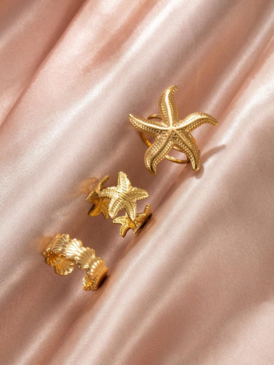 3件套度假风金色戒指套装，包含3D海星和贝壳纹理设计，清新海洋气息，适合女性日常、约会、派对、节日佩戴，亦可作为礼物搭配。 - 金色 - 查看 1