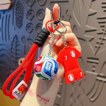 FIFA FIFA 1pc World Cup No.7 Jersey Shaped Keychain, Made Of High-Quality Soft Rubber Material, Thick And Durable, Vivid Colors And Clear Graphics, With Woven Hanging Rope And Metal Ring, Suitable For Bag, Car Key, And Backpack Decoration