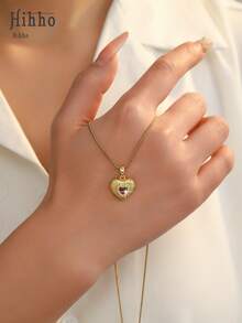 Hihho 1 chiếc dây chuyền mặt dây hình trái tim hai tông màu, phần giữa đính kim cương trắng/đỏ, xung quanh là những viên đá zirconia nhỏ, dây chuyền thép không gỉ thanh lịch, thích hợp cho đeo hàng ngày, lễ hội, tiệc tùng, làm quà tặng. - Vàng - Xem 8