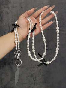 1条蝴蝶结珍珠斜挎肩带，简约奢华时尚手机挂绳，长款手工珍珠链条包带，通用手机支架带带夹子 - 彩色 - 查看 2