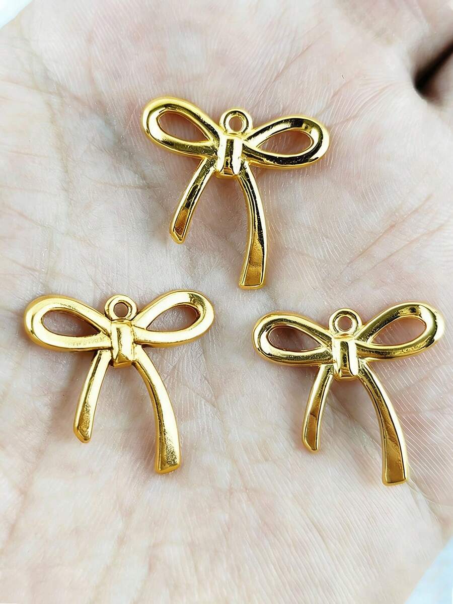 20pcs Zinc Alloy Electroplated Hollow Bowknot Pendant Charms For DIY Necklace Bracelet Earring Jewelry Making Accessories - Yellow Gold - View 1
