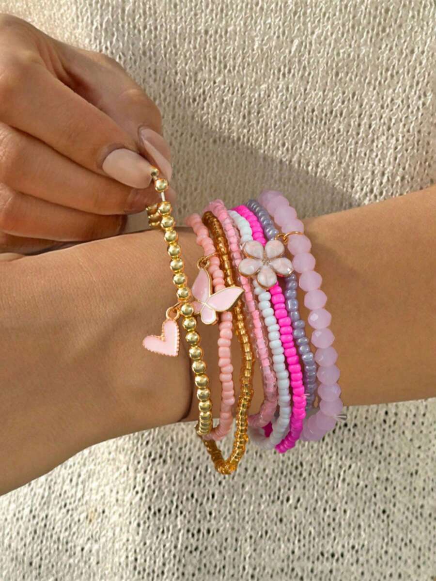 Bộ 8 chiếc vòng tay thời trang Bohemian mới với mặt dây chuyền hình hoa, trái tim, bướm và ngọc trai giả, dây thun, kiểu dáng thường ngày đi biển, họa tiết vỏ sò, món quà tuyệt vời. - Màu Hồng baby - Xem 1