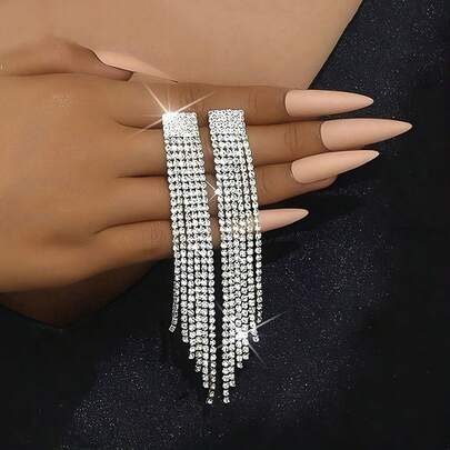 European And American Chic Tassel Earrings, Long Tassel Swaying Lively And Graceful. Fully Paved Claw-Set Craftsmanship Shines Dazzlingly, Exaggerated Design Self-Carries Focus. Flatters Face Shape When Worn, Inherent Sense Of Sophistication, Effortlessly Captures Party And Street Fashion Looks.