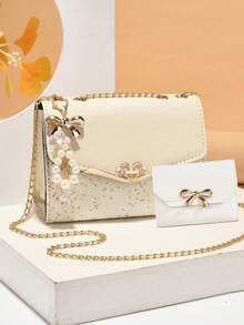 1个新款时尚女士PU单肩斜挎包，饰有蝴蝶结和仿珍珠吊坠，闪亮夺目，可调节肩带，时尚优雅，百搭实用，适合情人节，轻便斜挎单肩包，亮片装饰，磁扣开合，涤纶内衬，是购物、约会、通勤、派对的理想之选，也是送给女朋友、闺蜜生日、情人节的完美礼物。 - 彩色 - 查看 14