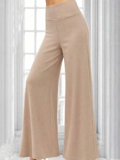 Spodnie damskie z wysokim stanem, szerokimi nogawkami, długie, rozszerzane, z krepy. , 32593