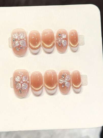 10pcs Handmade Wearable Nail Stickers, Pressure-Sensitive! This Set Of Golden Sakura Nails Is So Delicate. The Nude Pink Cat Eye Gradient Has Fine Glitters, Decorated With 3D Glass Flowers And Rhinestones. Wear Them And Become A Gentle Lady, Elevating The Atmosphere! Suitable For Girls'' Daily Wear Pressure-Sensitive Fake Nails.
