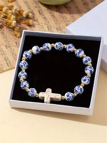 Pulsera con cruz, pulseras con cruz de Jesús para mujeres, pulseras con cuentas con estampado de flores de porcelana azul y blanca, accesorios católicos cristianos para el Día de la Ascensión - Azul - Ver 3