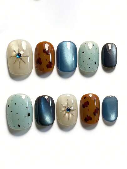 10pcs It Features A Sophisticated Color Palette Of Mixed Blue Tones And Amber Brown, Paired With Intricate Metallic Starburst Patterns And Blue Gem Accents, Exuding A Mysterious And High-Fashion Vibe. The Glossy Finish And Textured Details Create A Luxurious And Avant-Garde Texture. This Unique Style Is Perfect For Adding A Touch Of Edgy Elegance To Any Outfit, Making It Suitable For Artistic Events, Night Outings, And Seasonal Gatherings.