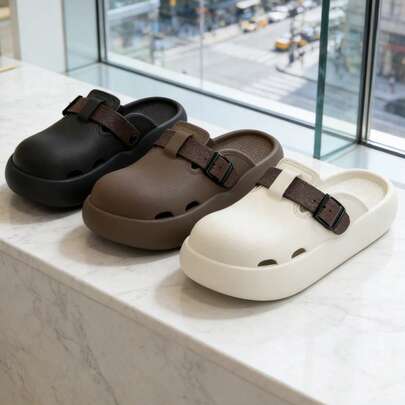 柔软鞋垫和防滑设计，无缝工艺，搭扣带元素，单色，带透气孔的闭趾设计，厚底，休闲穆勒鞋，简约风格，男女皆宜的日常穿着。