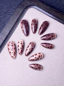 10片手工短指甲贴纸，包括法式美甲贴纸、杏仁形指甲贴纸、尖头指甲贴纸、Y2K风格指甲贴纸、紫色指甲贴纸、黑色指甲贴纸以及带有手绘豹纹的闪亮紫色猫眼指甲贴纸，并附赠美甲工具，方便粘贴和卸除。可爱的指甲贴纸，适合女士和女孩在秋季日常使用。按压式美甲贴纸。 - 亮橙色 - 查看 5