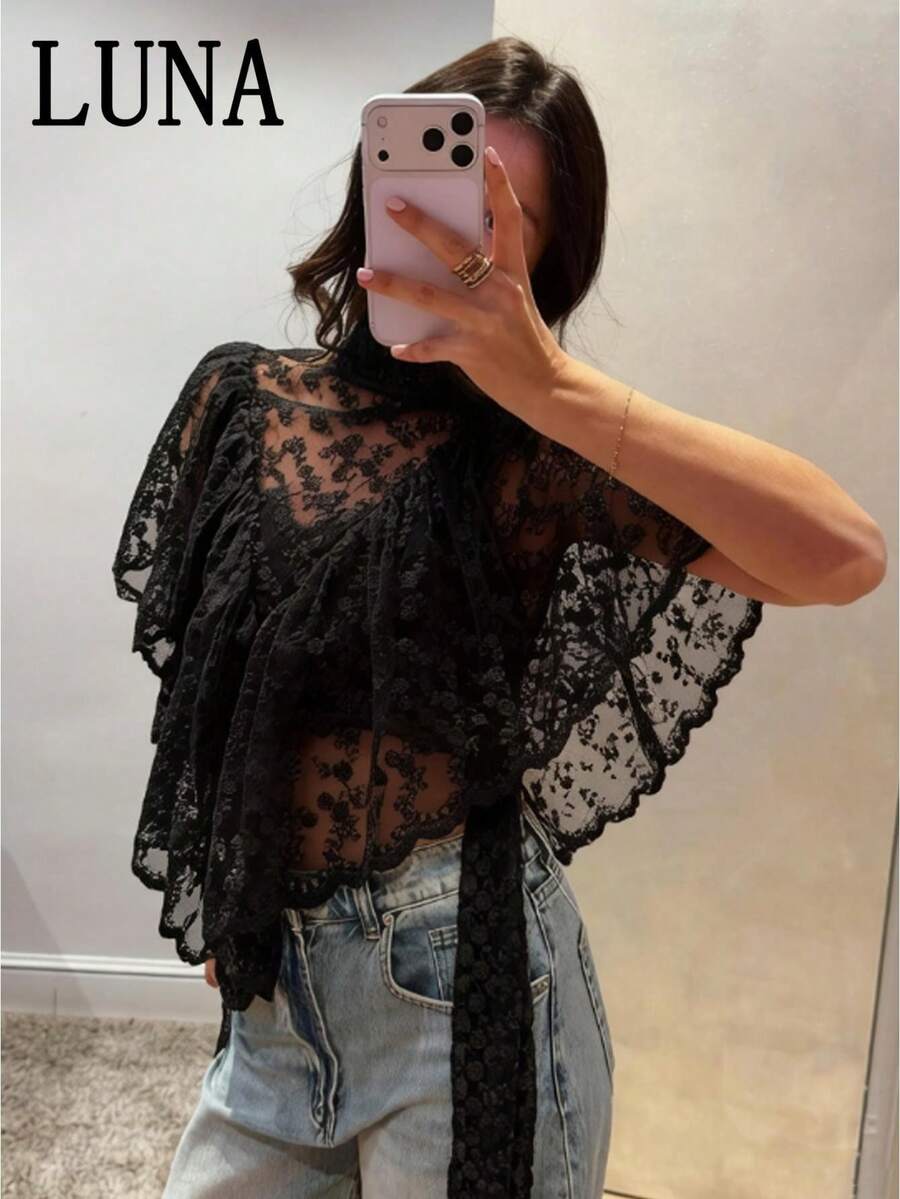 LUNA Top de verano para mujer, irregular, semitransparente y de encaje, con mangas acampanadas y volantes; camiseta de estilo casual, urbano y grunge, ideal para combinar con prendas vaqueras. - Negro - Ver 1