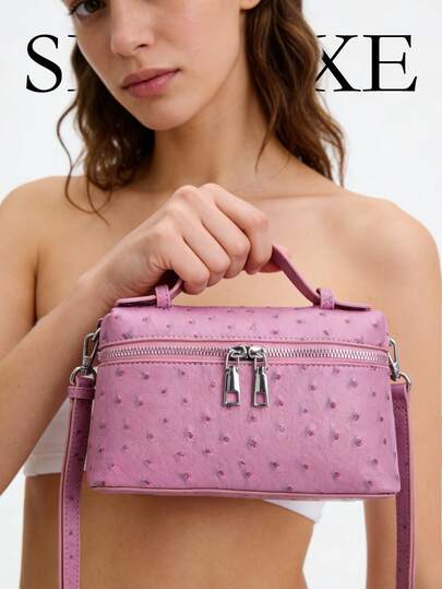 A Sweet And Edgy-Style Boxy Handbag In Pink Animal-Print PU Leather, Featuring A Double Zip Fastening And An Adjustable Long Shoulder Strap; Perfect For Everyday Wear And Shopping Trips