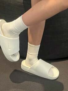 Dép xăng đan Nike Calm Slide Sail màu trắng dành cho nữ, thoải mái và êm ái. - trắng - Xem 2