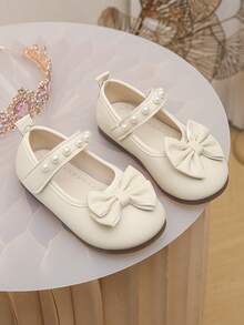 女婴/幼儿象牙色珍珠蝴蝶结公主鞋，软底防滑婴儿礼服鞋 - 米色 - 查看 3