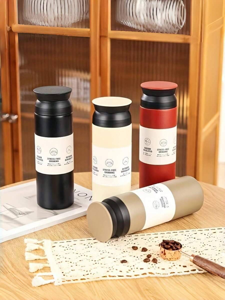 1 cốc giữ nhiệt kiểu Nhật tối giản, chất liệu thép không gỉ 304, dung tích 500ml, màu trắng.