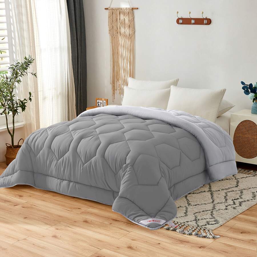 Novotextil 適用於90公分床（180x270公分）的冬季羽絨被 | 雙色羽絨被填充物，350克矽化中空纖維 | 柔軟、輕盈、透氣、雙面可用 | 雙色羽絨被填充物，350克矽化中空纖維 | 柔軟、輕盈、透氣、雙面可用 | 保暖、觸感柔軟、易於清洗的冬季羽絨被送 | 寒冷天氣下舒適的睡眠之選 ✅達 西班牙24/7小時全境送達/7小時 - 灰色/灰色 - 查看 1