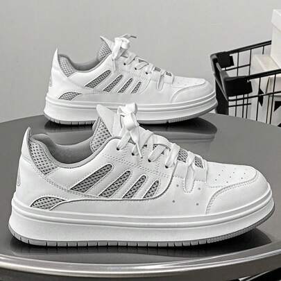 男士休闲运动鞋，低帮真皮男士平底滑板鞋，时尚男士户外运动鞋，轻便防滑休闲鞋，适合日常活动和街头滑板，是搭配牛仔裤和运动鞋的理想选择。