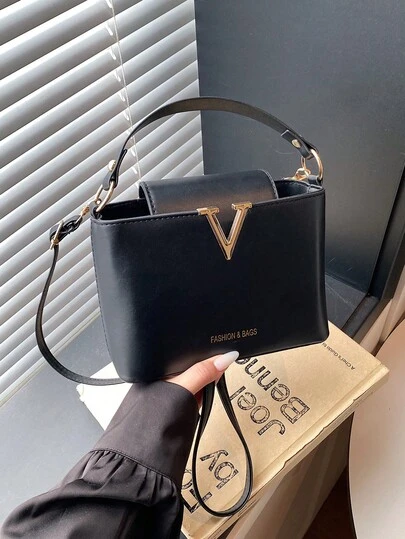 1个女士手提包，适合日常通勤、旅行、购物和散步